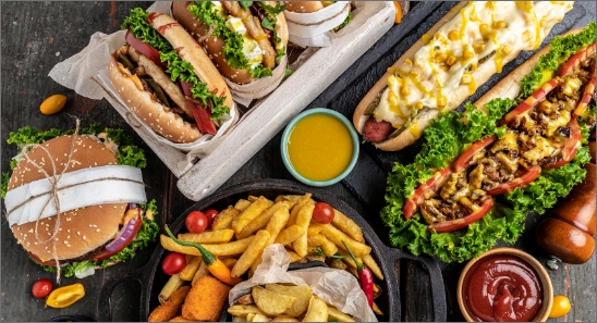 american-fast-food-hamburgers-french-fries-hot-dogs-fast-food-unhealthy-eating-concept-top-view